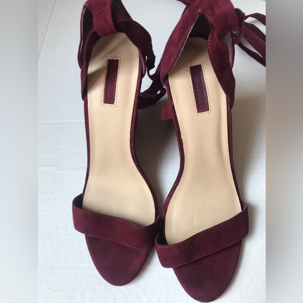 Faux suede Burgundy wedge heels with leg ties size 9.